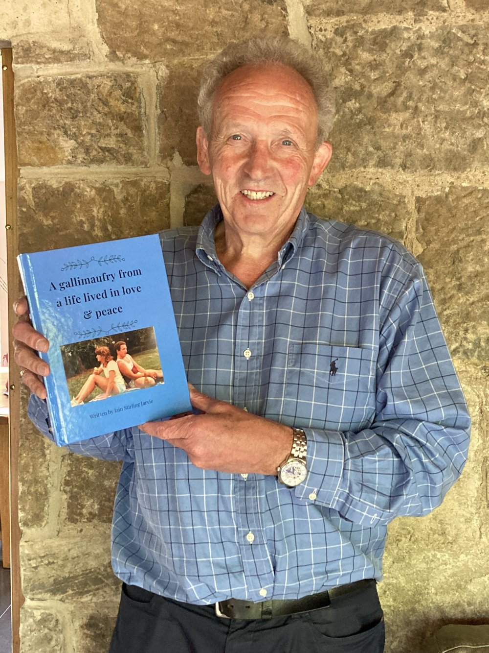 A YourStory customer holding his finished book
