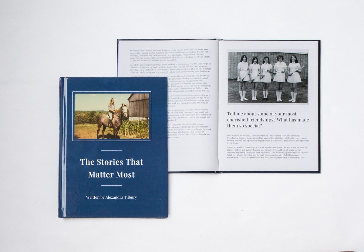A finished YourStory hardback beside an open spread
